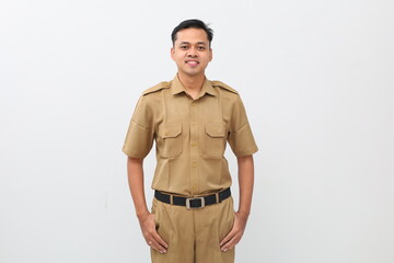 Fototapeta premium Indonesian Civil servant with uniform standing while looking at the camera