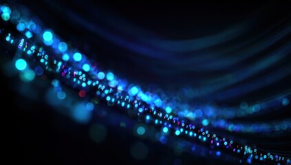 Abstract dark background with glowing blue binary code stream and bokeh.