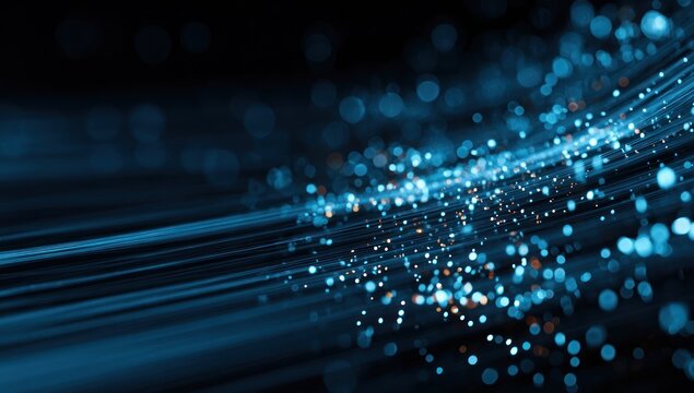 Abstract blue light streaks and bokeh particles flow across dark background. - Powered by Adobe