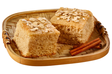 cesta de palha com bolo integral de aveia, mel e canela isolado em fundo transparente