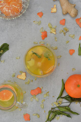 Cocktail with tangerines, mango, ginger and spices. Celebration of life event, New Year's Eve, 
name day or anniversary.