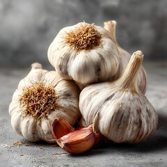 Pile of Image White Garlic Bulbs with Cloves on Textured Surface