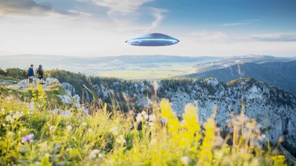 People on a mountain looking at a ufo flying over a valley with flowers in the foreground and blue sky
