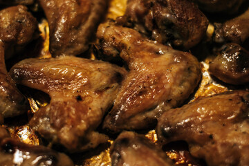 Close-up of homemade baked chicken wings with a golden crust
