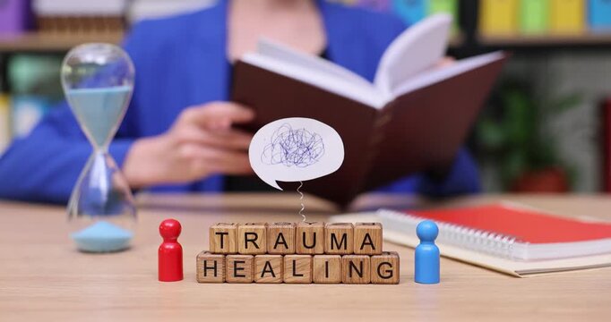 Exploring trauma healing techniques with an engaging book and calming surroundings