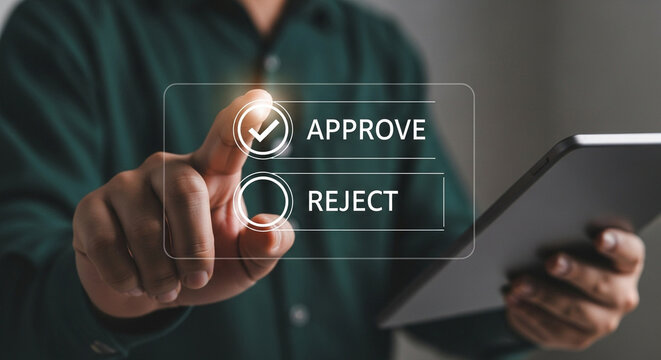 Person using a digital tablet to approve a request showcasing modern technology and decisionmaking processes in a business setting highlighting efficiency and digital transformation in workflow manage