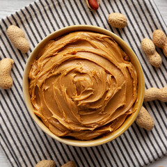 Creamy Brown Peanut Butter in a Bowl, top view.