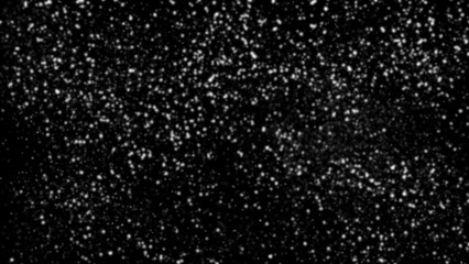 winter blurred snowflakes falling on black background