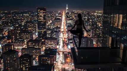 Woman doing yoga on balcony with city lights at night. Meditation. - Powered by Adobe