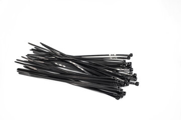 Bunch of Black Cable Ties Isolated on White Background © DuanWed
