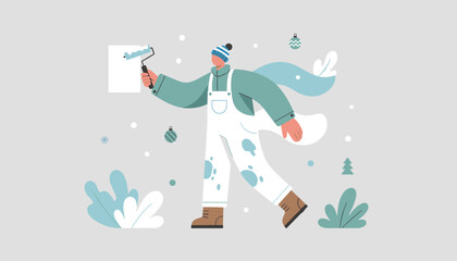Holiday prep Person painting fresh background with roller surrounded by winter decor