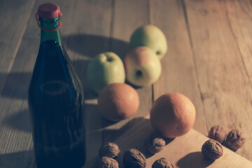 Bottle of wine and fruit, close-up