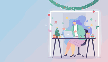 Businesswoman working remotely on laptop at Christmas decorated desk Holiday work concept