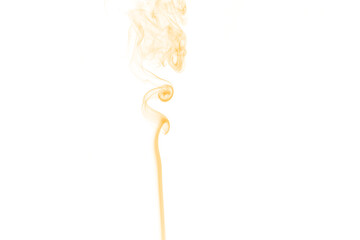 Abstract swirling smoke in vibrant orange and yellow hues against a stark black background creating a dynamic and ethereal visual