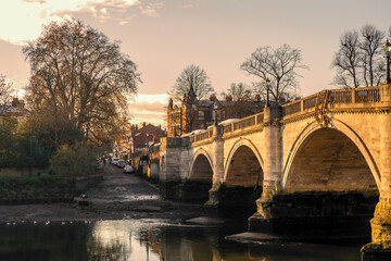 Scenic view of the 18th-century Richmond Bridge across the Thames on a cold, frosty day in late autumn, early winter in Richmond, London, England, UK