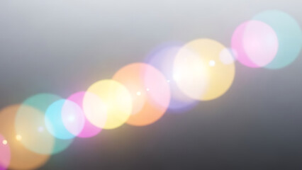 Colorful diagonal bokeh light leak background texture creating a mesmerizing cinematic lens flare effect.