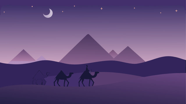 Camels walking near pyramids during night time