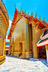The shrine decorated with golden ceramic tiles, Wat Ratchabophit temple in Bangkok, Thailand