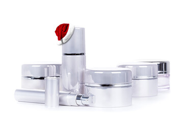 Santa Claus Hat  on tube. Collection of skin care spa products on white background. Christmas celebration