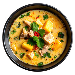 Saoto soup a traditional surinamese chicken soup with vermicelli boiled egg and celery served steaming and isolated on white background