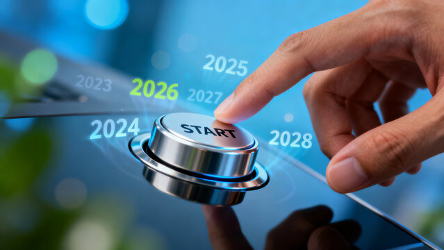 Determined finger pressing start button for future year 2026 business targets new goal using digital technology