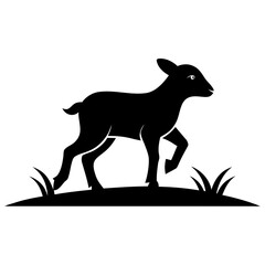 Black silhouette of a young goat walking on grassy hill