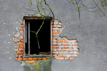 Old wooden frame window in ruins