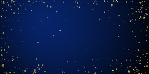 Gold sparkling star confetti.