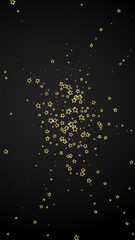 Gold sparkling star confetti.