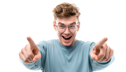 Excited young man pointing fingers in casual clothes with glasses on transparent background in studio shot