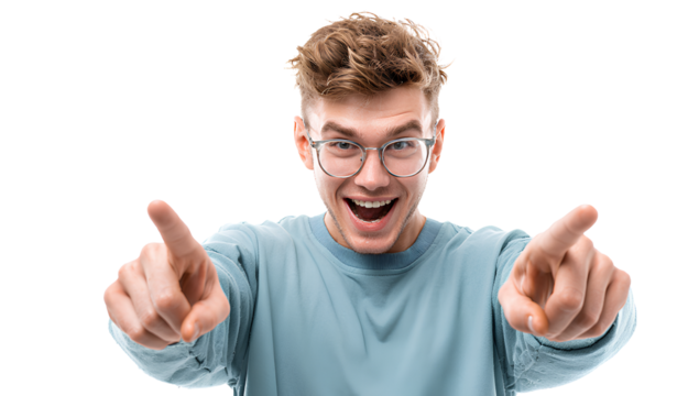 Excited young man pointing fingers in casual clothes with glasses on transparent background in studio shot