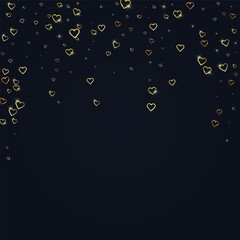 Gold hearts scattered on black background.