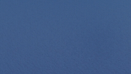 A close-up shot of a solid dark blue paper background, showcasing a subtle yet distinct fine-grained texture suitable for various design projects