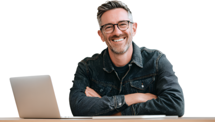 Smiling attractive man with glasses using laptop on transparent background isolated