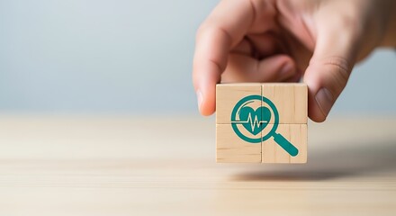 Hand holding wooden block with heart and magnifying glass symbolizing health checkup and medical research for cardiovascular wellness and disease prevention