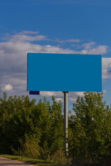 Large white billboards for outdoor advertising along the roads