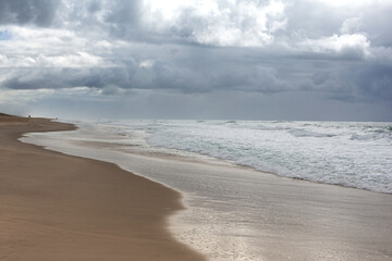 The ebb and flow of the tide on the shore