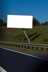 White billboard along the highway. Background for design and advertising.
