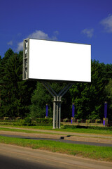 Fototapeta premium Background for design, white billboards on city streets and along roads in the summer day