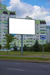 Background for design, white billboards on city streets and along roads in the summer day