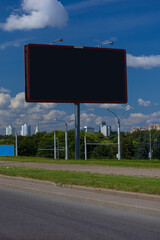 Background for design, billboards on city streets and along roads in the summer day