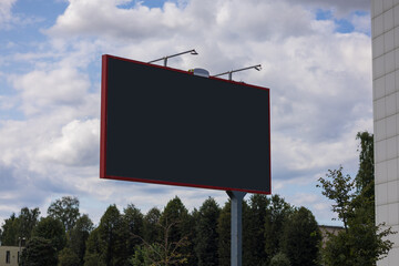Background for design, billboards on city streets and along roads in the summer day