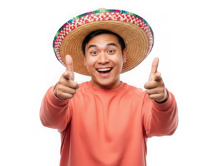 Cheerful young man in a traditional mexican sombrero pointing at the camera with both hands, isolated on transparent background