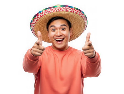 Cheerful young man in a traditional mexican sombrero pointing at the camera with both hands, isolated on transparent background