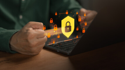 Person working on laptop with digital lock icon, illustrating cybersecurity protection, data privacy, secure access, encryption systems, and modern online safety for personal and business information.