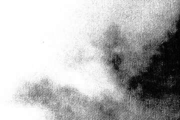 Naklejka premium Macro halftone print forming soft cloud-like shapes that fade from light to dense shadow on a transparent background. Slightly unfocused, it resembles drifting clouds or smoky atmospheric forms.
