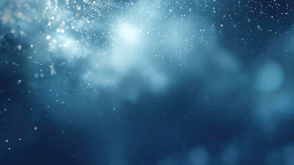 An ethereal blue background with shimmering white particles falling from a bright, diffuse light source, creating a magical and serene atmosphere.