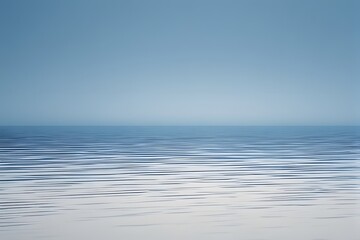 Fototapeta premium Serene Minimalist Seascape with Calm Water and Clear Blue Sky