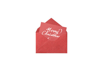 white handwritten Christmas card from a red glitter envelope, overhead view	