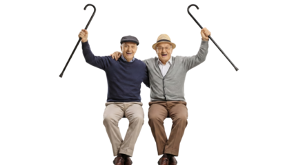 Two Senior Men Cheering With Walking Canes, Celebrating Friendship and Accomplishments on an